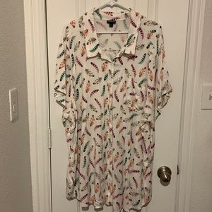 Torrid size 6 button up blouse with feather design. Only worn once.